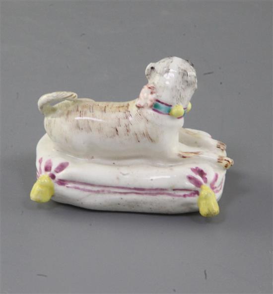 An extremely rare Derby or Girl-on-a-Horse factory figure of a pug, c.1755, l. 6.5cm, some restoration